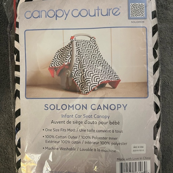 New in package car seat cover. Black, white and red. One size fits most - Picture 1 of 3